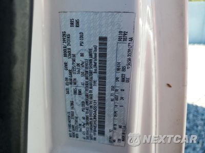 Zdjęcie 13 z 15 samochodu: 2009 FORD ECONOLINE E350 SUPER DUTY WAGON VIN:1FBNE31L89DA55131 - miniatura