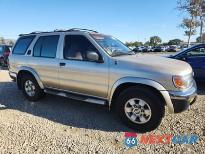 Czwarte zdjęcie samochodu z boku: 1999 NISSAN PATHFINDER LE VIN:JN8AR05Y2XW311160 - miniatura