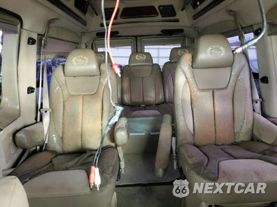 Zdjęcie 10 z 14 samochodu: 2004 FORD ECONOLINE E150 VAN VIN:1FDRE14LX4HA54850 - miniatura