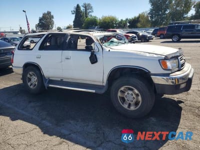 Czwarte zdjęcie samochodu z boku: 1999 TOYOTA 4RUNNER SR5 VIN:JT3GN86R6X0127502 - miniatura