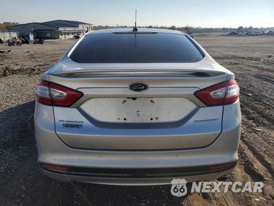 Zdjęcie 6 z 11 samochodu: 2013 FORD FUSION TITANIUM PHEV VIN:3FA6P0SU5DR274134 - miniatura