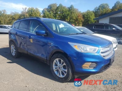 Czwarte zdjęcie samochodu z boku: 2017 FORD ESCAPE SE VIN:1FMCU9GD2HUD50101 - miniatura