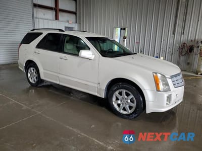 Czwarte zdjęcie samochodu z boku: 2007 CADILLAC SRX VIN:1GYEE637970180599 - miniatura