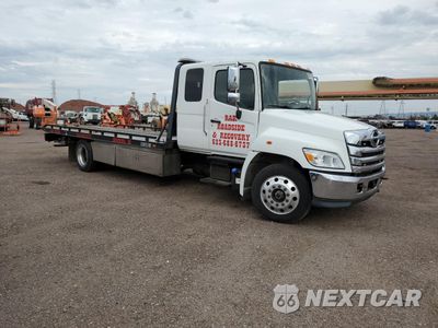 Czwarte zdjęcie samochodu z boku: 2022 INTERNATIONAL MV607 - SEMI TRUCK VIN:1HTEUMML9NH565817 - miniatura