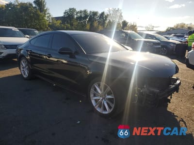 Czwarte zdjęcie samochodu z boku: 2016 AUDI A7 PRESTIGE VIN:WAU2GAFC6GN110542 - miniatura