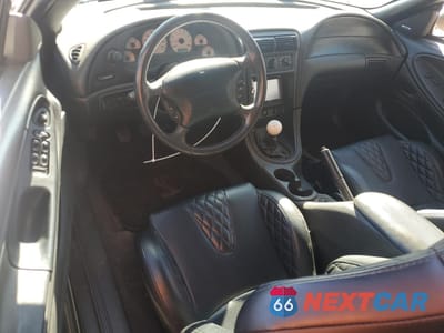 Zdjęcie 8 z 12 samochodu: 1999 FORD MUSTANG COBRA SVT VIN:1FAFP46V8XF197626 - miniatura