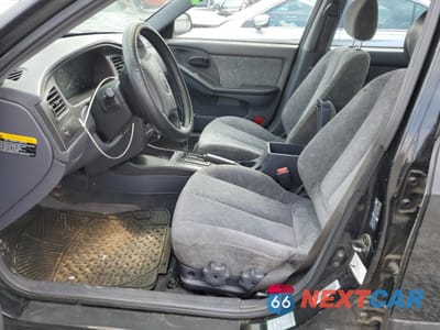 Zdjęcie 7 z 14 samochodu: 2002 HYUNDAI ELANTRA GLS VIN:KMHDN45D72U427687 - miniatura