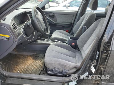 Zdjęcie 7 z 14 samochodu: 2002 HYUNDAI ELANTRA GLS VIN:KMHDN45D72U427687 - miniatura