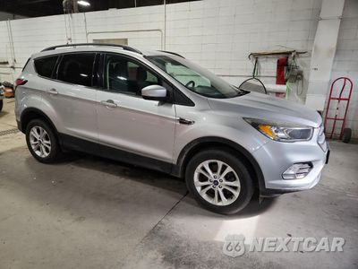 Czwarte zdjęcie samochodu z boku: 2018 FORD ESCAPE SE VIN:1FMCU9GD9JUD59805 - miniatura