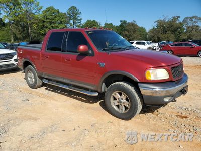 Czwarte zdjęcie samochodu z boku: 2002 FORD F150 SUPERCREW VIN:1FTRW08L22KD60401 - miniatura