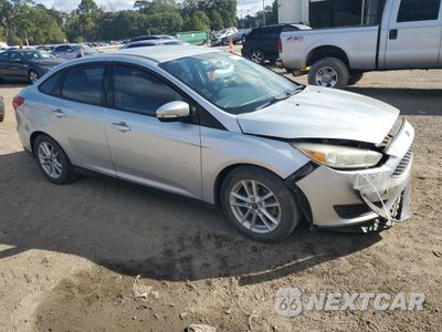 Czwarte zdjęcie samochodu z boku: 2016 FORD FOCUS SE VIN:1FADP3F22GL290103 - miniatura