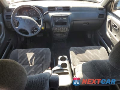 Zdjęcie 8 z 13 samochodu: 1999 HONDA CR-V LX VIN:JHLRD1846XC041933 - miniatura