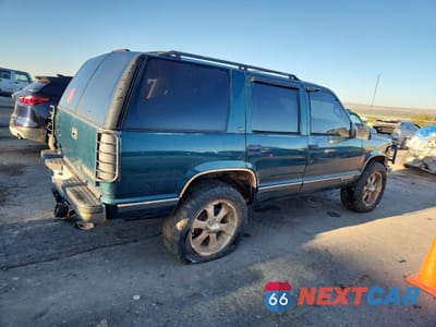 Trzecie zdjęcie samochodu z tyłu: 1999 CHEVROLET TAHOE K1500 VIN:1GNEK13R3XJ513285 - miniatura