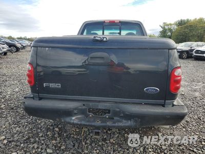 Zdjęcie 6 z 14 samochodu: 2003 FORD F150 VIN:2FTRF07W03CA38504 - miniatura