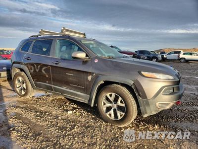 Czwarte zdjęcie samochodu z boku: 2014 JEEP CHEROKEE TRAILHAWK VIN:1C4PJMBS5EW201706 - miniatura