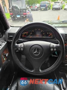 Zdjęcie 8 z 13 samochodu: 2005 MERCEDES-BENZ G 500 VIN:WDCYR49E85X158464 - miniatura