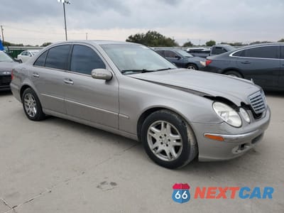 Czwarte zdjęcie samochodu z boku: 2003 MERCEDES-BENZ E 320 VIN:WDBUF65J23A310409 - miniatura