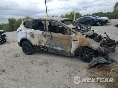 Czwarte zdjęcie samochodu z boku: 2017 FORD ESCAPE SE VIN:1FMCU0GD4HUD27513 - miniatura