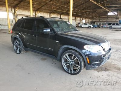 Czwarte zdjęcie samochodu z boku: 2012 BMW X5 XDRIVE50I VIN:5UXZV8C5XCL423880 - miniatura