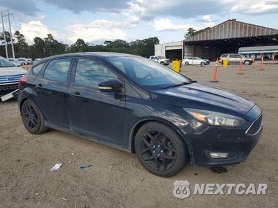 Czwarte zdjęcie samochodu z boku: 2016 FORD FOCUS SE VIN:1FADP3K25GL332477 - miniatura