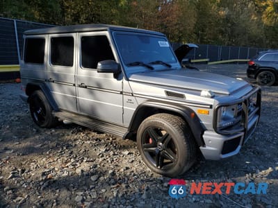 Czwarte zdjęcie samochodu z boku: 2016 MERCEDES-BENZ G 63 AMG VIN:WDCYC7DF2GX254936 - miniatura