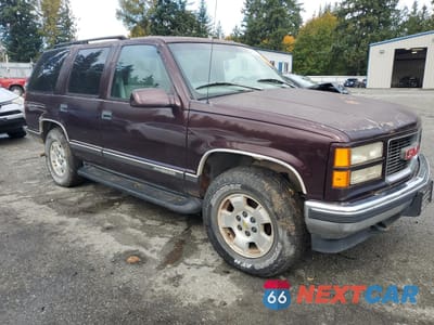 Czwarte zdjęcie samochodu z boku: 1997 GMC YUKON VIN:1GKEK13R6VJ707898 - miniatura