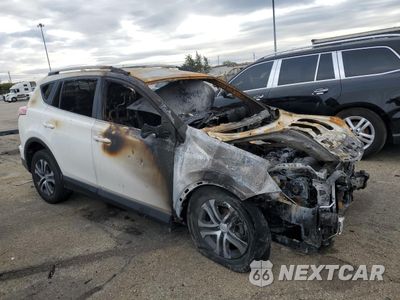 Czwarte zdjęcie samochodu z boku: 2016 TOYOTA RAV4 LE VIN:JTMBFREV3GJ083427 - miniatura