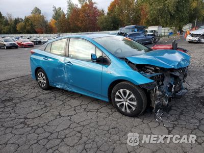 Czwarte zdjęcie samochodu z boku: 2021 TOYOTA PRIUS PRIME LE VIN:JTDKAMFP1M3195449 - miniatura