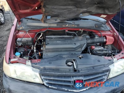 Zdjęcie 12 z 13 samochodu: 2002 HONDA ODYSSEY EXL VIN:2HKRL18022H535796 - miniatura