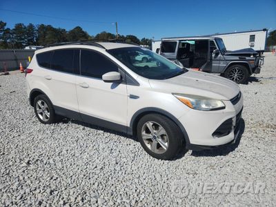 Czwarte zdjęcie samochodu z boku: 2014 FORD ESCAPE SE VIN:1FMCU0GX9EUA50671 - miniatura