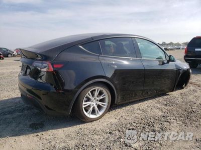 Trzecie zdjęcie samochodu z tyłu: 2021 TESLA MODEL Y VIN:5YJYGDEE0MF077176 - miniatura