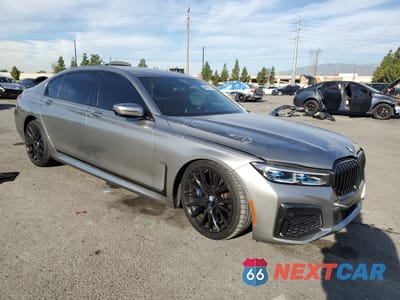 Czwarte zdjęcie samochodu z boku: 2020 BMW 750 XI VIN:WBA7U2C04LGM27863 - miniatura