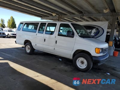 Czwarte zdjęcie samochodu z boku: 2003 FORD ECONOLINE E350 SUPER DUTY WAGON VIN:1FBSS31S83HB06758 - miniatura