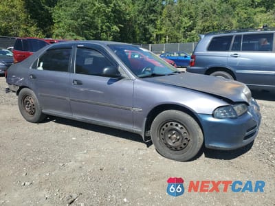 Czwarte zdjęcie samochodu z boku: 1995 HONDA CIVIC LX VIN:1HGEG8555SL044356 - miniatura