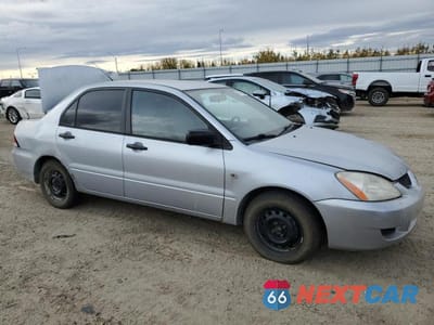Czwarte zdjęcie samochodu z boku: 2003 MITSUBISHI LANCER LS VIN:JA3AJ36EX3U610764 - miniatura