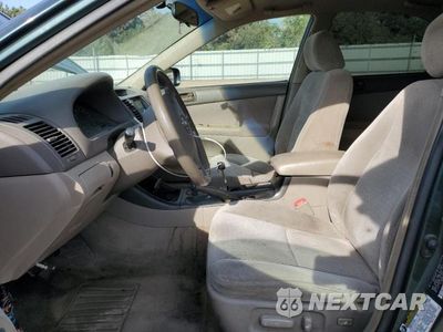Zdjęcie 7 z 11 samochodu: 2004 TOYOTA CAMRY LE VIN:4T1BE32K24U351285 - miniatura