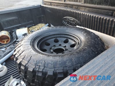 Zdjęcie 12 z 14 samochodu: 1999 FORD F250 SUPER DUTY VIN:1FTNX21F6XEA41262 - miniatura