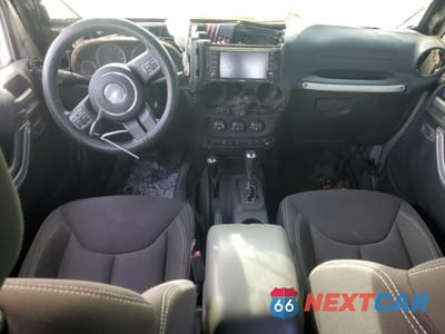 Zdjęcie 8 z 13 samochodu: 2014 JEEP WRANGLER UNLIMITED SAHARA VIN:1C4BJWEG0EL233817 - miniatura