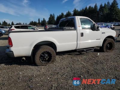 Trzecie zdjęcie samochodu z tyłu: 1999 FORD F250 SUPER DUTY VIN:1FTNF20F5XEE97600 - miniatura