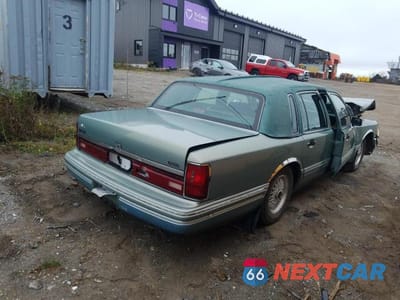 Trzecie zdjęcie samochodu z tyłu: 1994 LINCOLN TOWN CAR EXECUTIVE VIN:1LNLM81W9RY665394 - miniatura