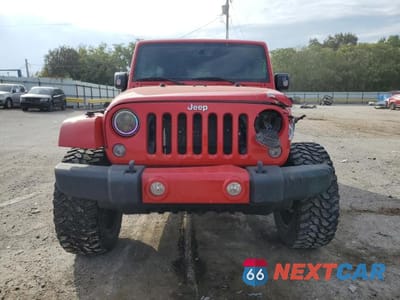 Piąte zdjęcie samochodu w środku: 2015 JEEP WRANGLER UNLIMITED SAHARA VIN:1C4BJWEG7FL685877 - miniatura