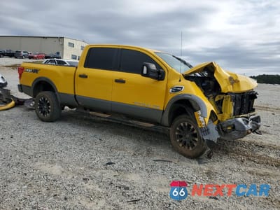 Czwarte zdjęcie samochodu z boku: 2016 NISSAN TITAN XD SL VIN:1N6BA1F49GN505079 - miniatura