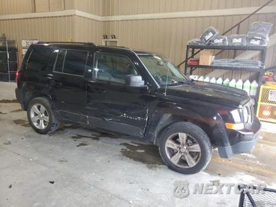 Czwarte zdjęcie samochodu z boku: 2014 JEEP PATRIOT LATITUDE VIN:1C4NJPFB1ED890089 - miniatura