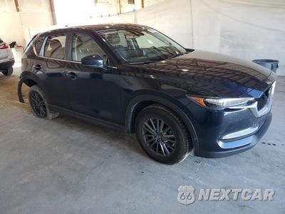 Czwarte zdjęcie samochodu z boku: 2021 MAZDA CX-5 TOURING VIN:JM3KFBCM9M1351918 - miniatura