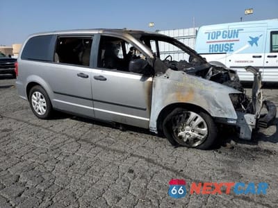 Czwarte zdjęcie samochodu z boku: 2016 DODGE GRAND CARAVAN SE VIN:2C4RDGBG9GR137419 - miniatura