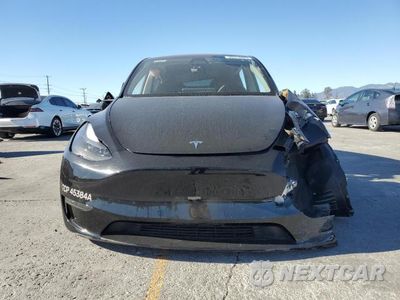 Piąte zdjęcie samochodu w środku: 2024 TESLA Y VIN:7SAYGDEE9RF070754 - miniatura
