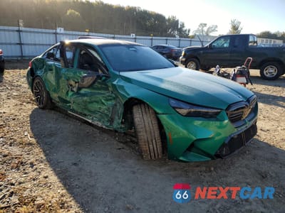 Czwarte zdjęcie samochodu z boku: 2026 BMW M5 VIN:WBS83FK05TCV67939 - miniatura