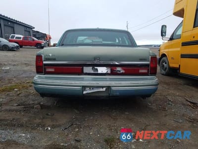 Zdjęcie 6 z 11 samochodu: 1994 LINCOLN TOWN CAR EXECUTIVE VIN:1LNLM81W9RY665394 - miniatura