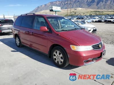 Czwarte zdjęcie samochodu z boku: 2004 HONDA ODYSSEY EX VIN:5FNRL18844B149579 - miniatura