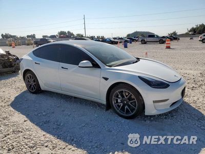 Czwarte zdjęcie samochodu z boku: 2022 TESLA MODEL 3 VIN:5YJ3E1EB8NF341217 - miniatura